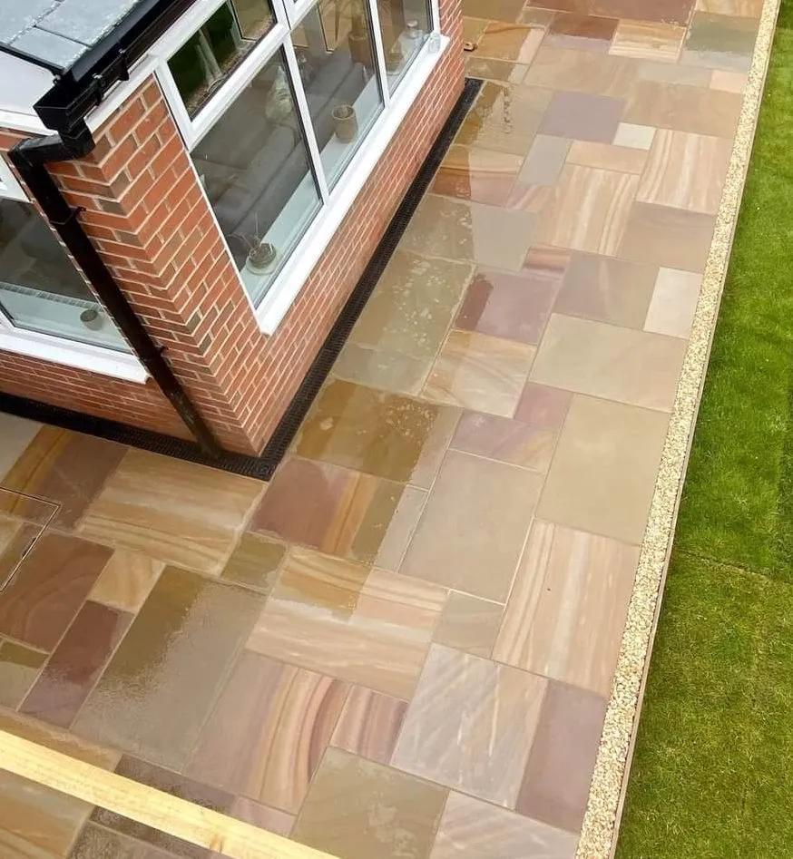 Camel Buff Smooth Rippon sandstone, honed surface in daylight