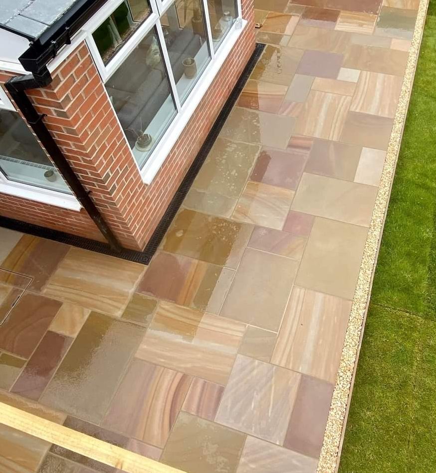 Camel Buff Smooth Rippon sandstone, honed surface in daylight