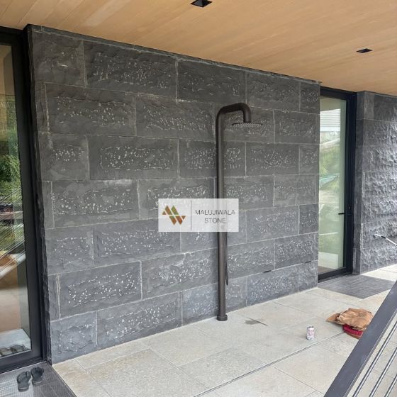 Rockface and chiselled basalt cladding