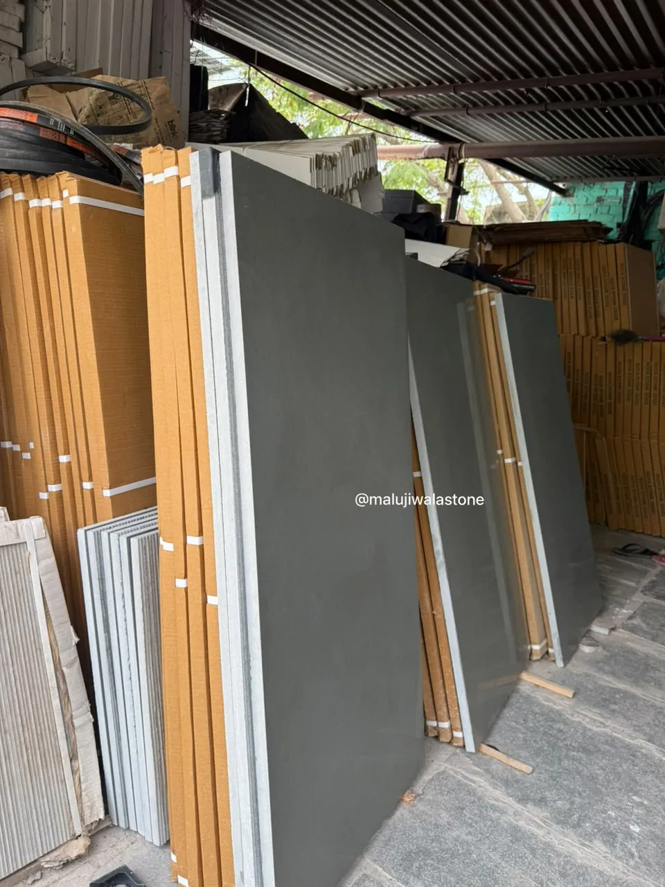 Polished green Kota Stone 4 × 2 floor tiles