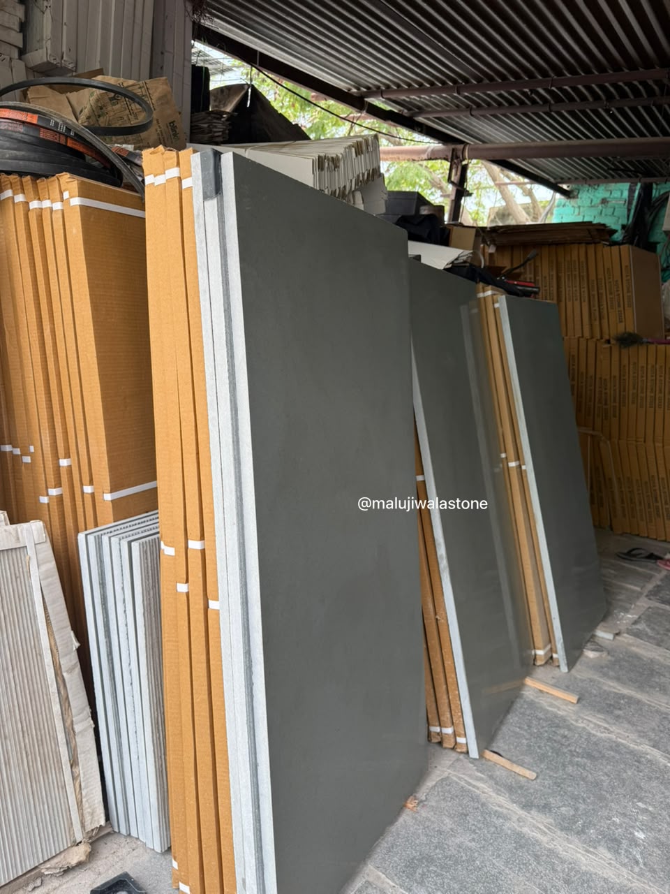Polished green Kota Stone 4 × 2 floor tiles