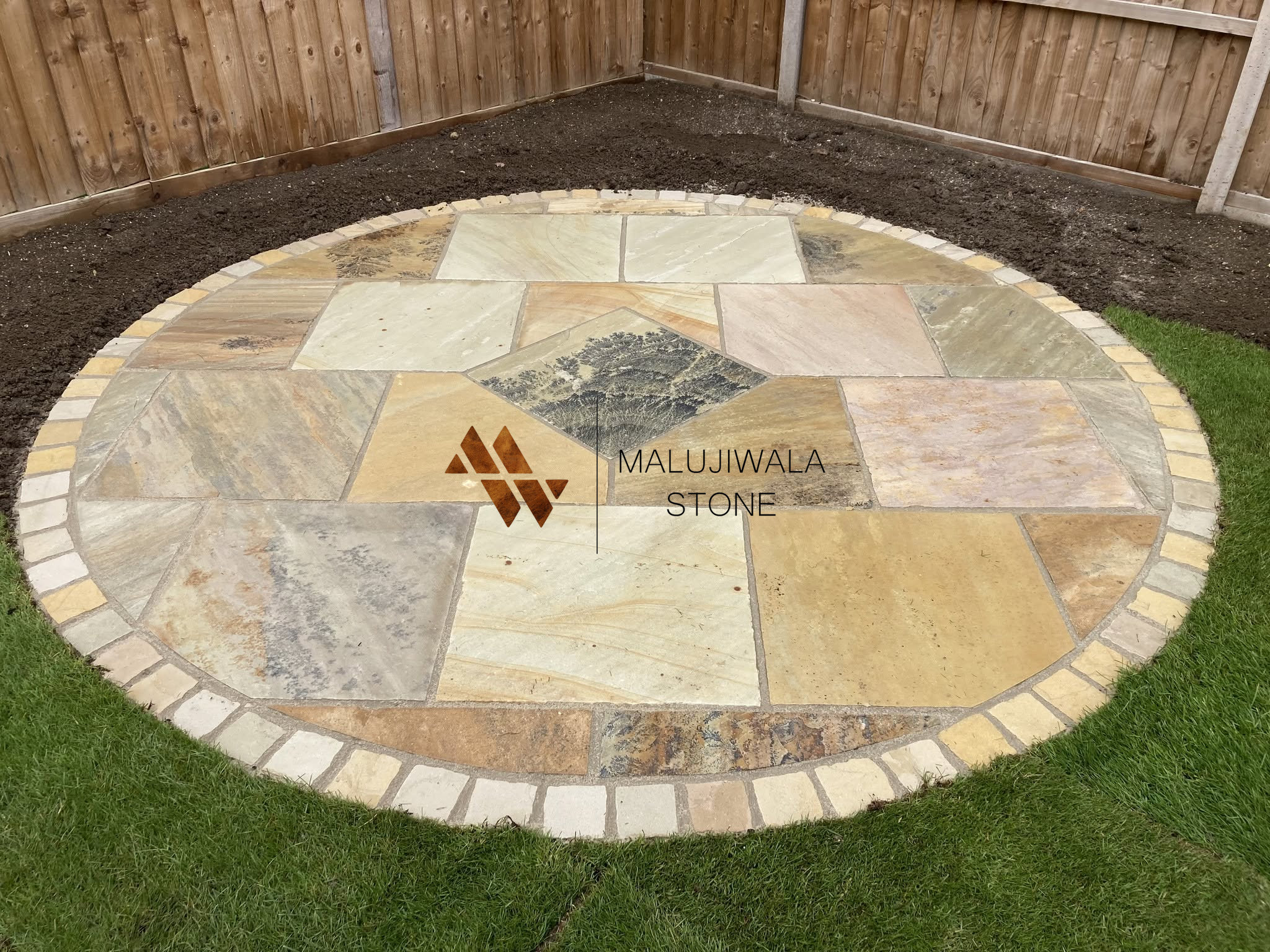Fossil mint sandstone laid in a circular paving pattern