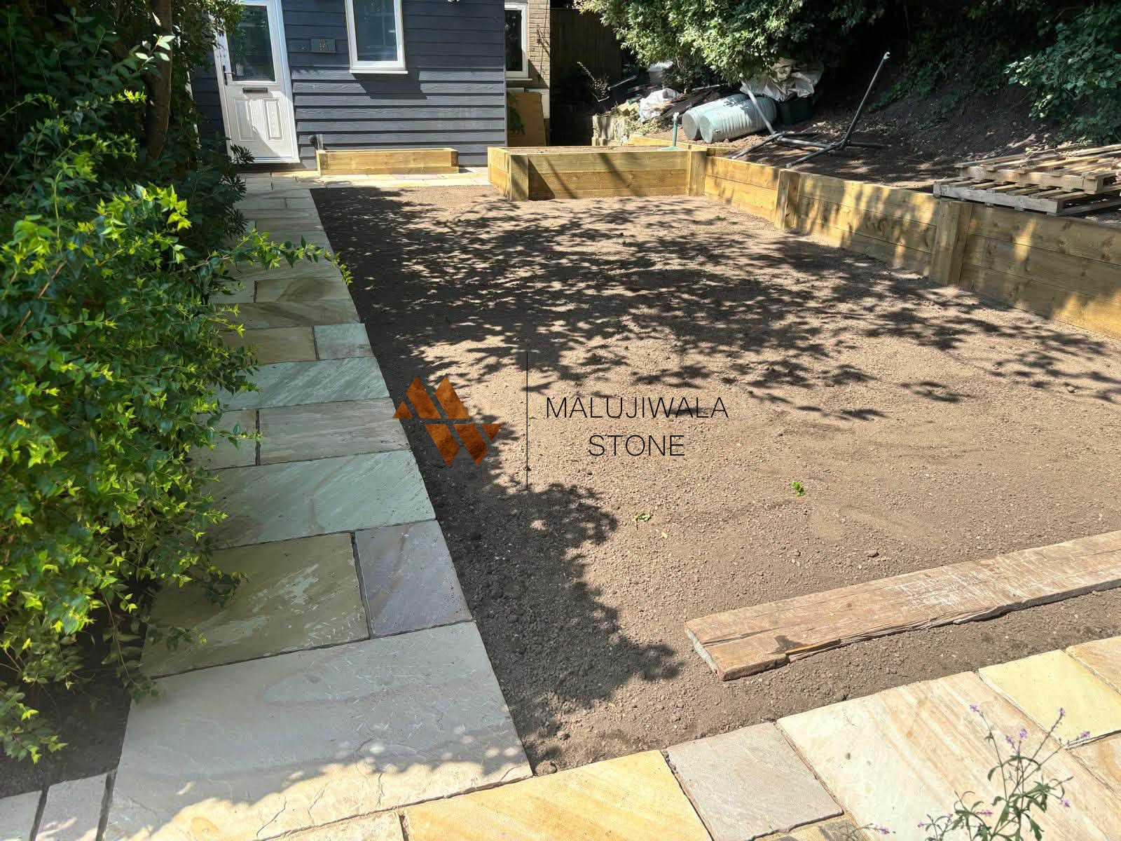 Fossil mint sandstone paving slabs showing natural colour variation