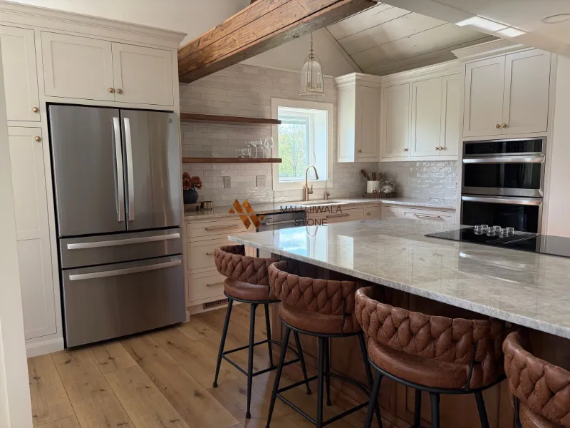 Taj Mahal quartzite kitchen island from Malujiwala Stone (1 of 3)