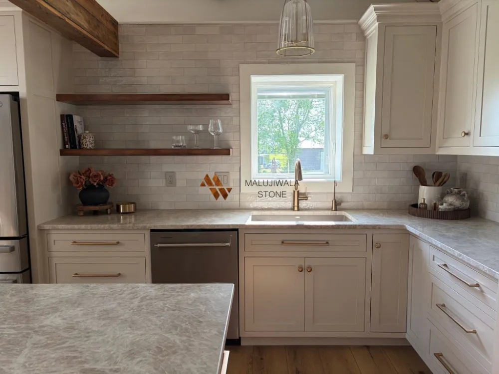 Taj Mahal quartzite countertop at a kitchen sink (3 of 3)