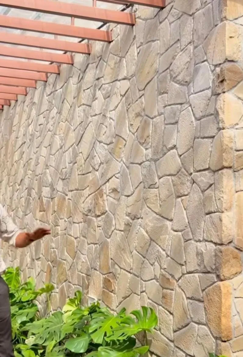 Jurassic Fieldstone RR cladding on a garden feature wall under a timber pergola